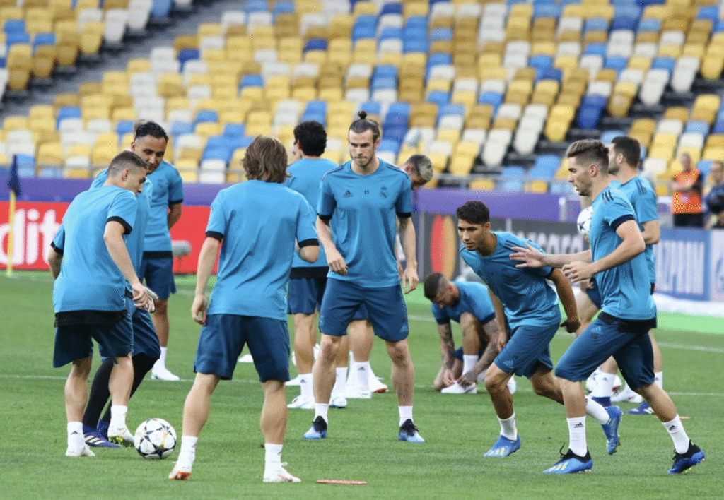 Professional football teams Real Madrid, Liverpool Manchester City performing rondo training drills for elite Toronto football coaching inspiration