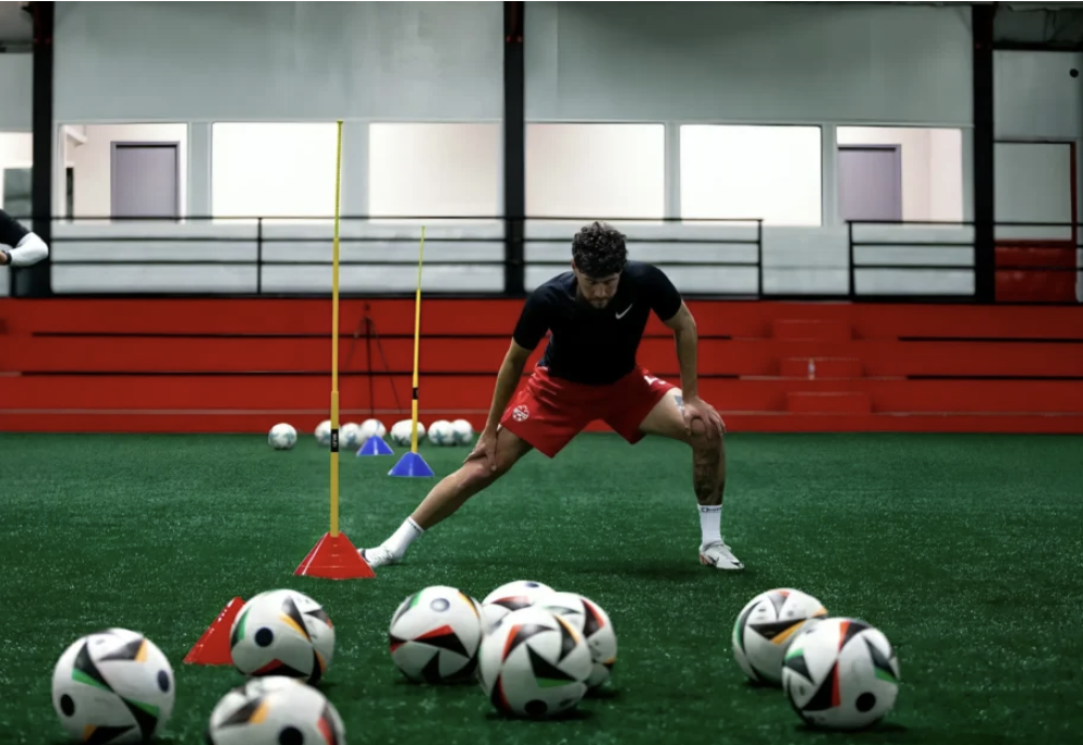 Soccer goalkeeper training with multiple balls at Toronto indoor facility