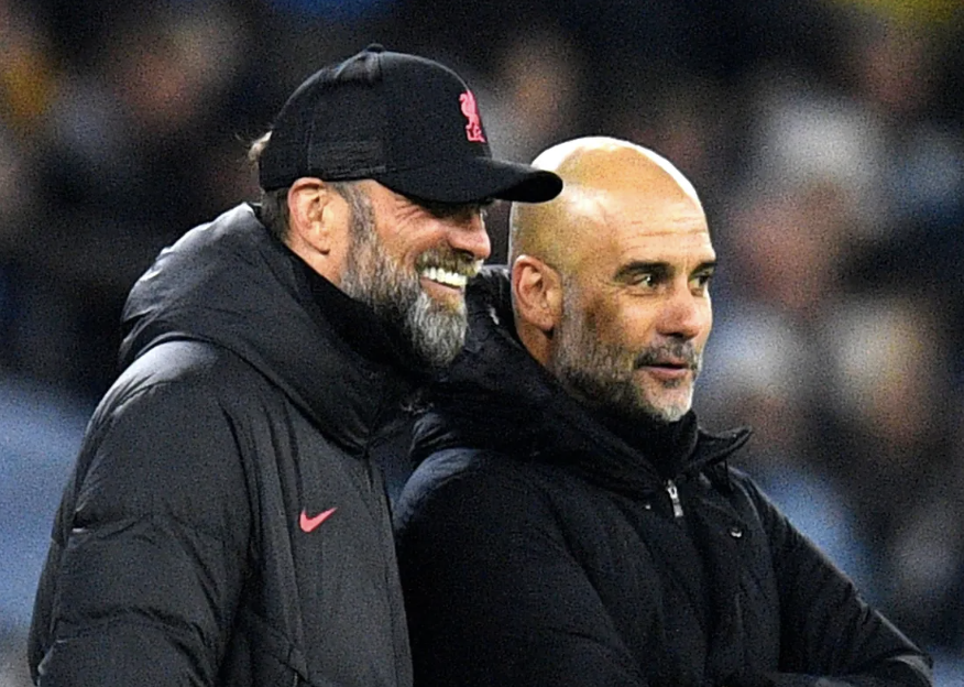 Jurgen Klopp and Pep Guardiola in tactical discussion during Premier League match, showcasing the elite coaching rivalry that revolutionized modern soccer tactics
